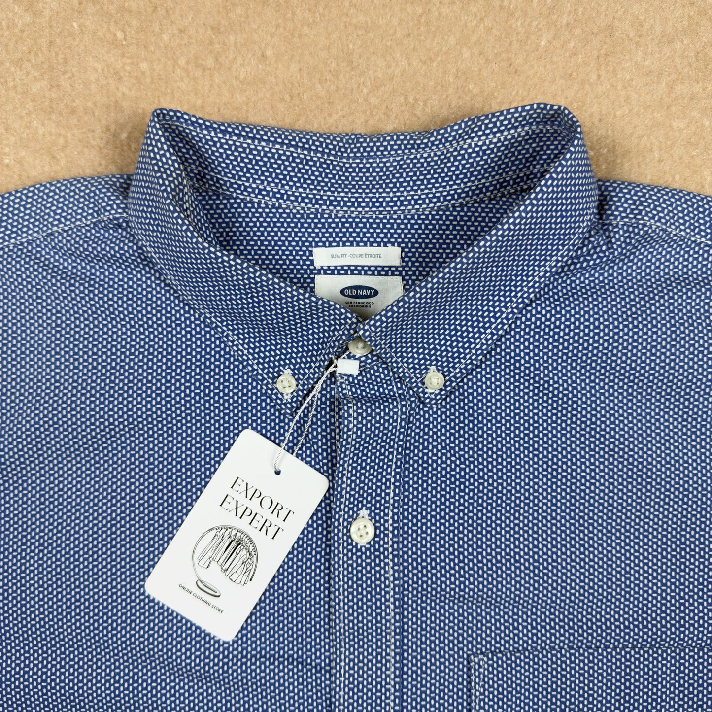 Collar and tag detail of Old Navy slim fit navy shirt with Export Expert tag