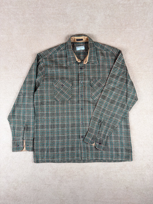 Plaid shirt with a collar on a light gray background